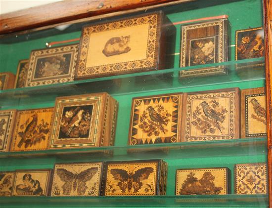 A collection of Tunbridge ware boxes, cabinet 24in.